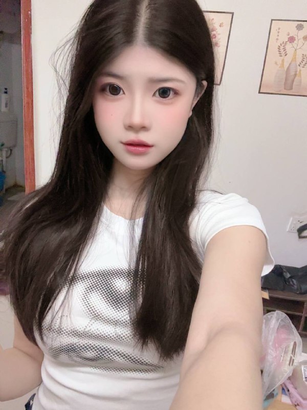 七七